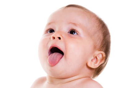 baby showing tongue